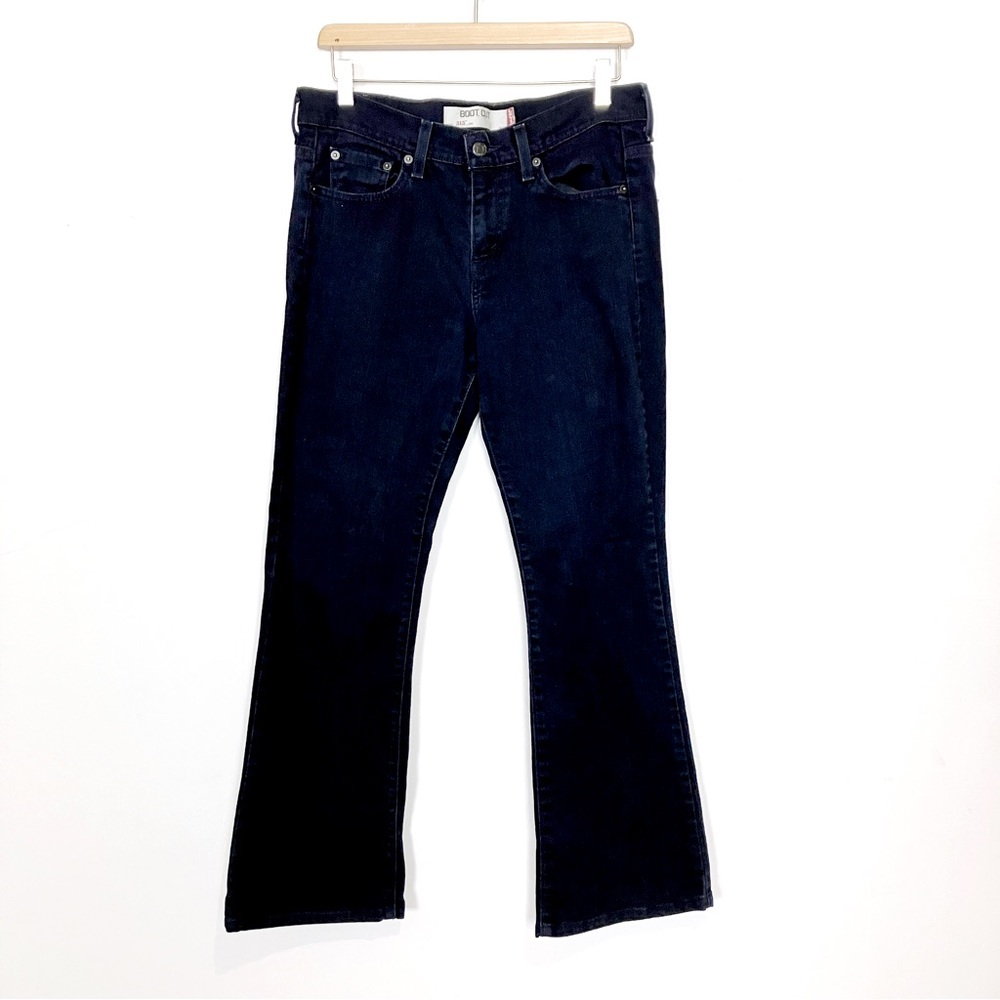 Vintage y2k Levi’s 515 bootcut jeans dark wash 2000s style blue stretch flared